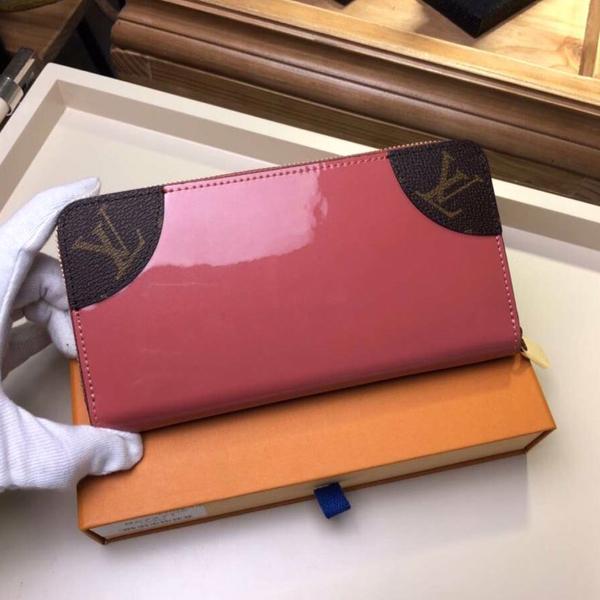 ルイヴィトン 財布コピー ジッピーウォレット ピンク長財布 カーフスキン M62318 でカラフルな 斬新なデザイン